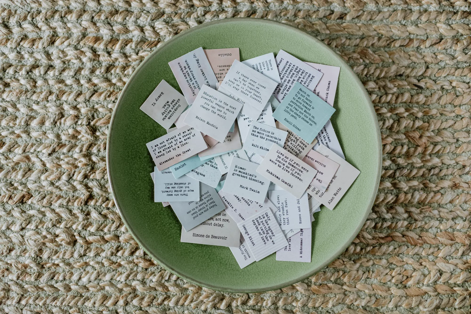 A bowl of folded affirmation cards ready for guided journaling.